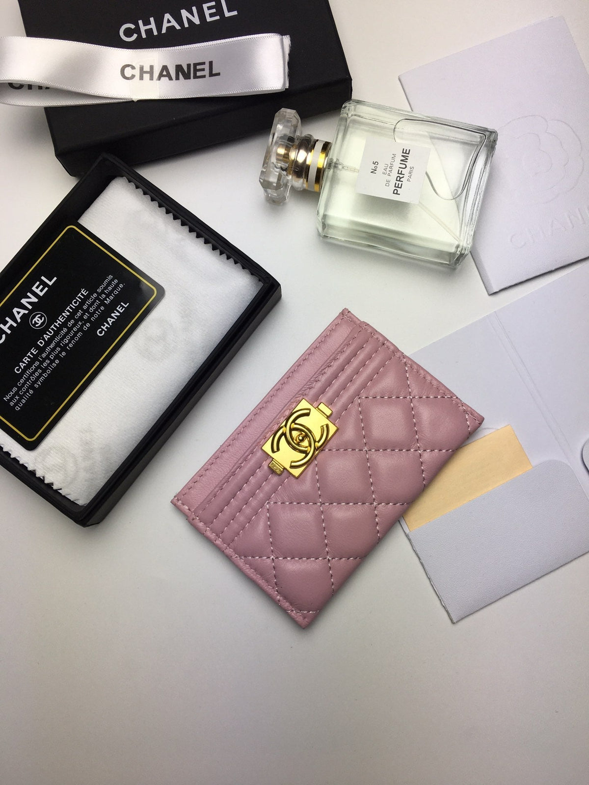 CC BOY CARD HOLDER 11.2 BABY PINK CALFSKIN GOLD ICON