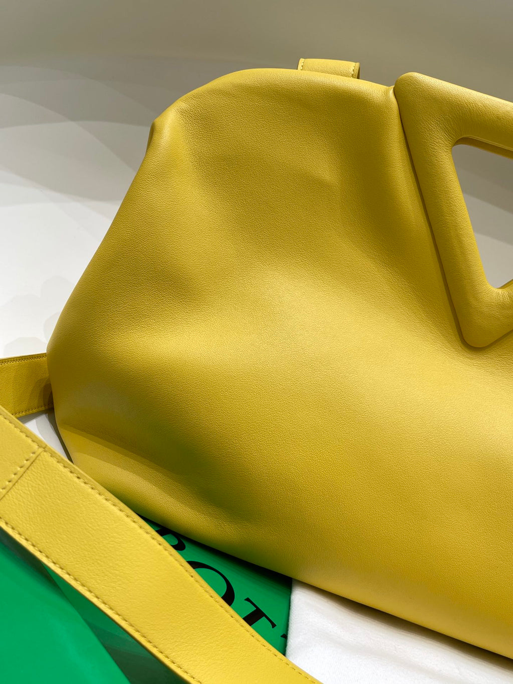 TRIANGLE HANDLE BAG 31 IN DANDELION YELLOW LAMBSKIN