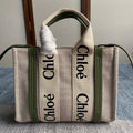 SMALL STRAP WOODY TOTE BAG 26.5 IN BEIGE LINEN CANVAS BLACK WEBBING LOGO EMBROIDER GREEN CALFSKIN