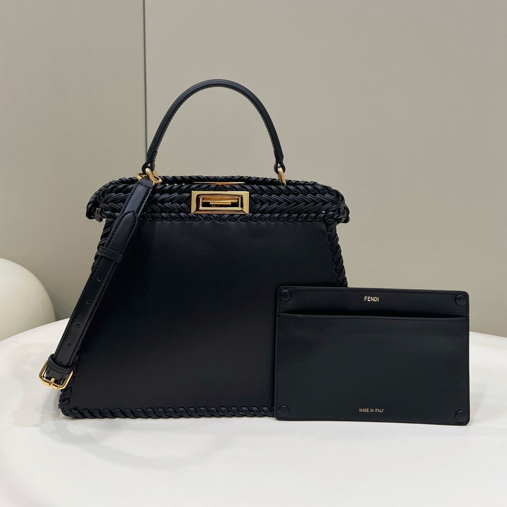PEEKABOO ISEEU 27 IN BLACK SMOOTH CALFSKIN WITH WOVEN TRIM GOLD HARDWARE