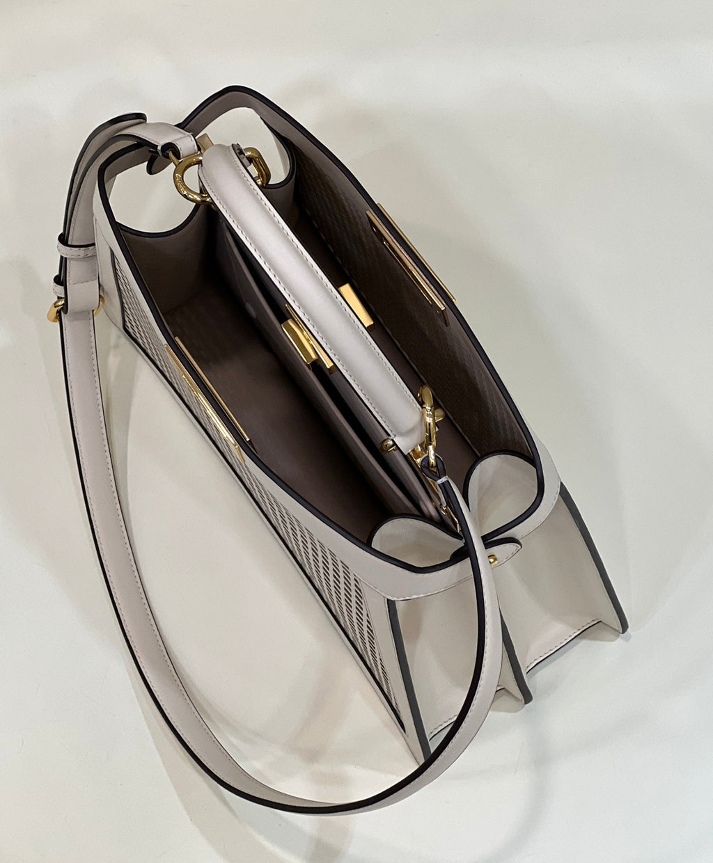 PEEKABOO ISEEU 34 IN WHITE PERFORATED CALFSKIN GOLD HARDWARE