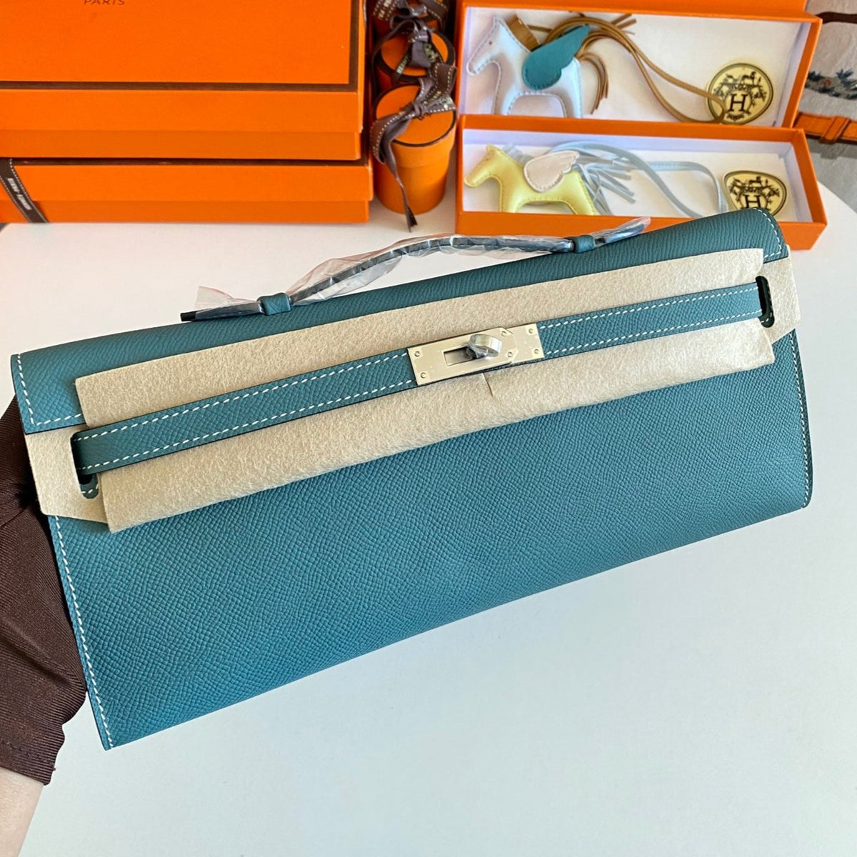KELLY CUT 31 IN AZURE BLUE CALFSKIN WITH SILVER HARDWARE