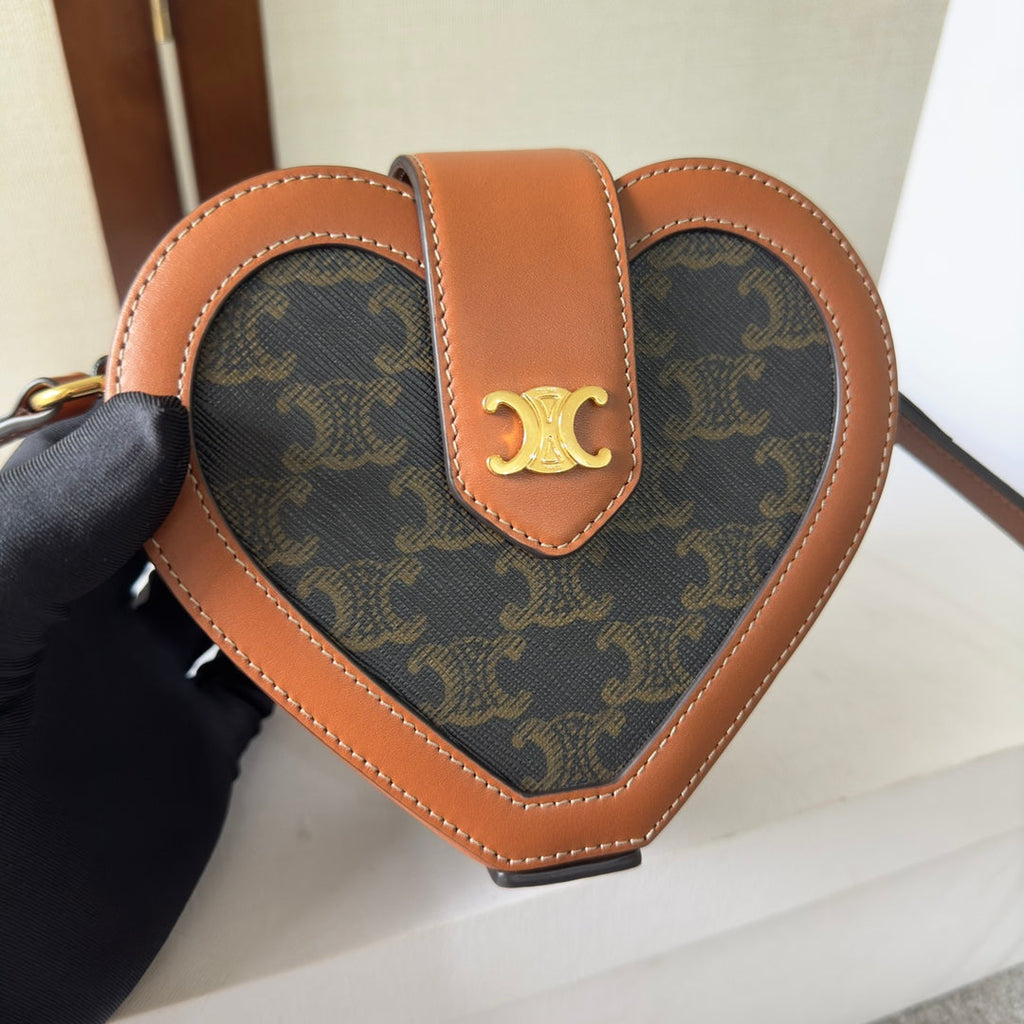 HEART TAMBOUR BAG 15 IN BLACK TRIOMPHE CANVAS AND BRONZE BROWN CALFSKIN