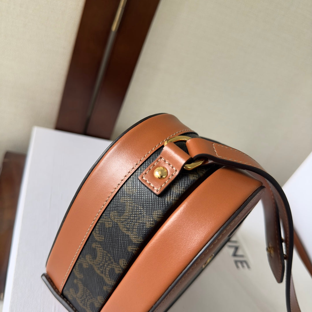 HEART TAMBOUR BAG 15 IN BLACK TRIOMPHE CANVAS AND BRONZE BROWN CALFSKIN