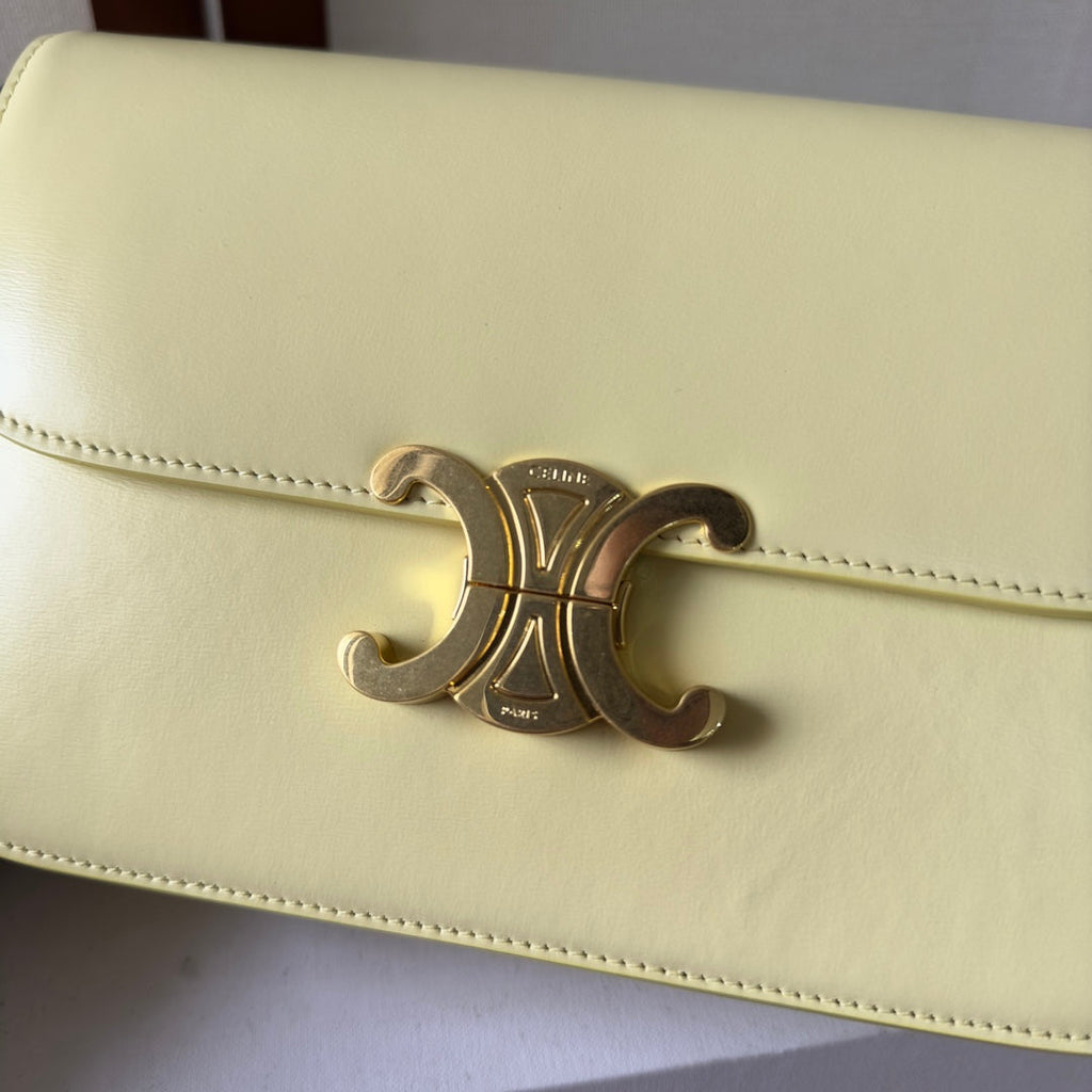 CLASSIQUE TRIOMPHE BAG 22 IN YELLOW CALFSKIN