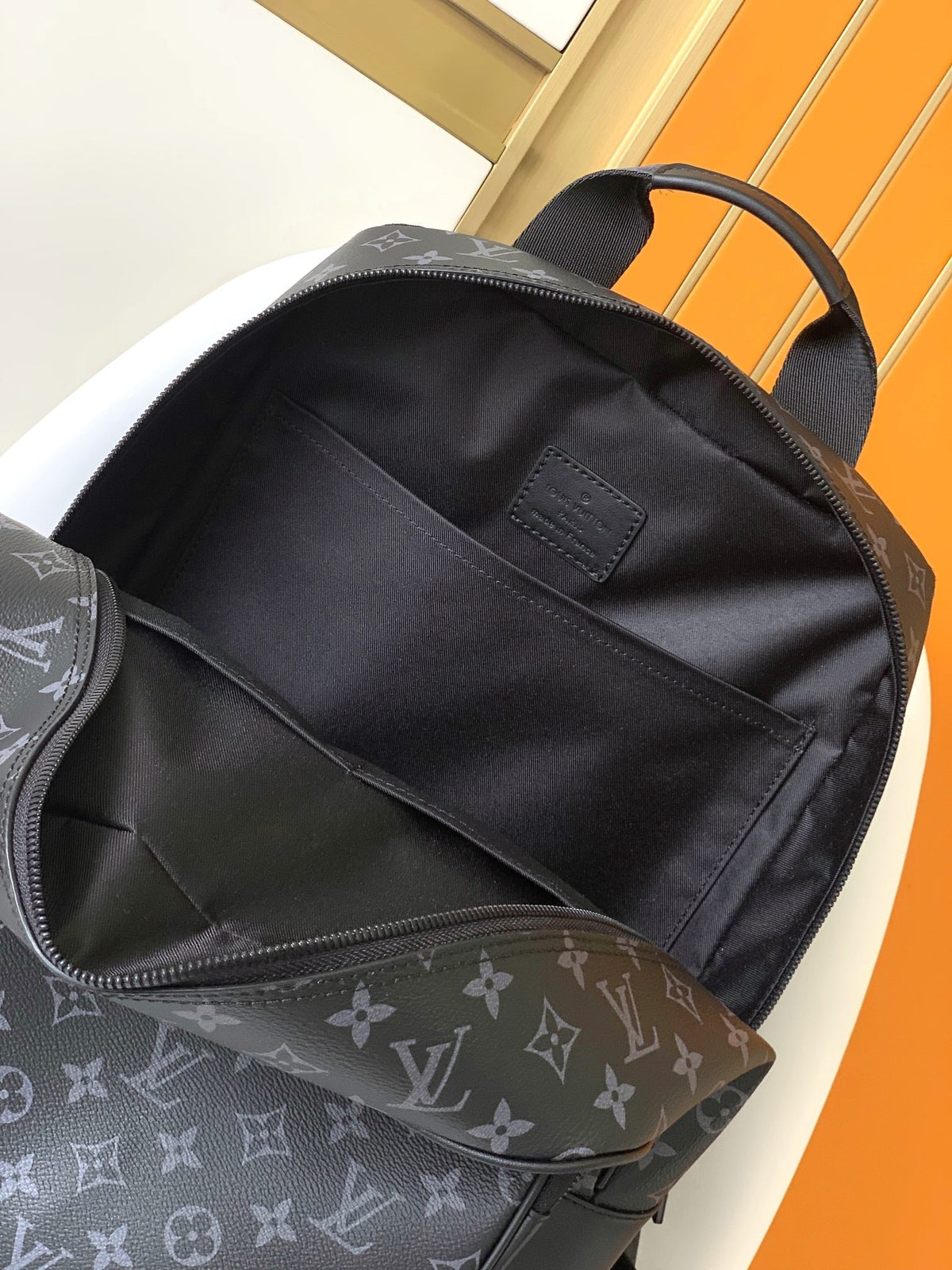 DISCOVERY BACKPACK 41 IN BLACK MONOGRAM MACASSAR CANVAS AND CALFSKIN