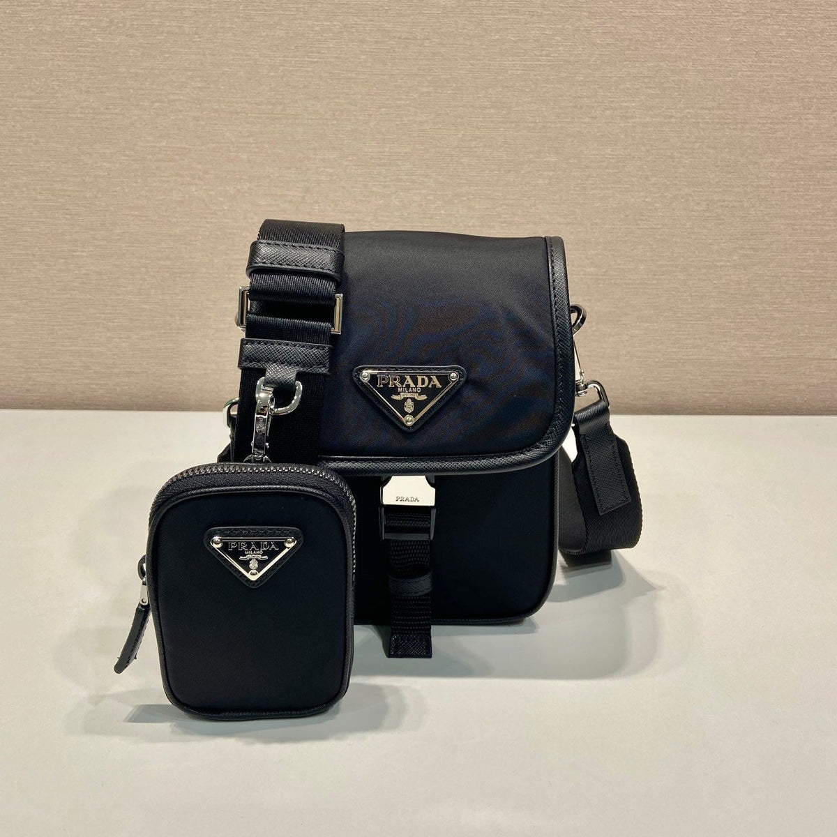 PHONE BAG 19 IN BLACK RE-NYLON AND SAFFIANO LEATHER TRIM