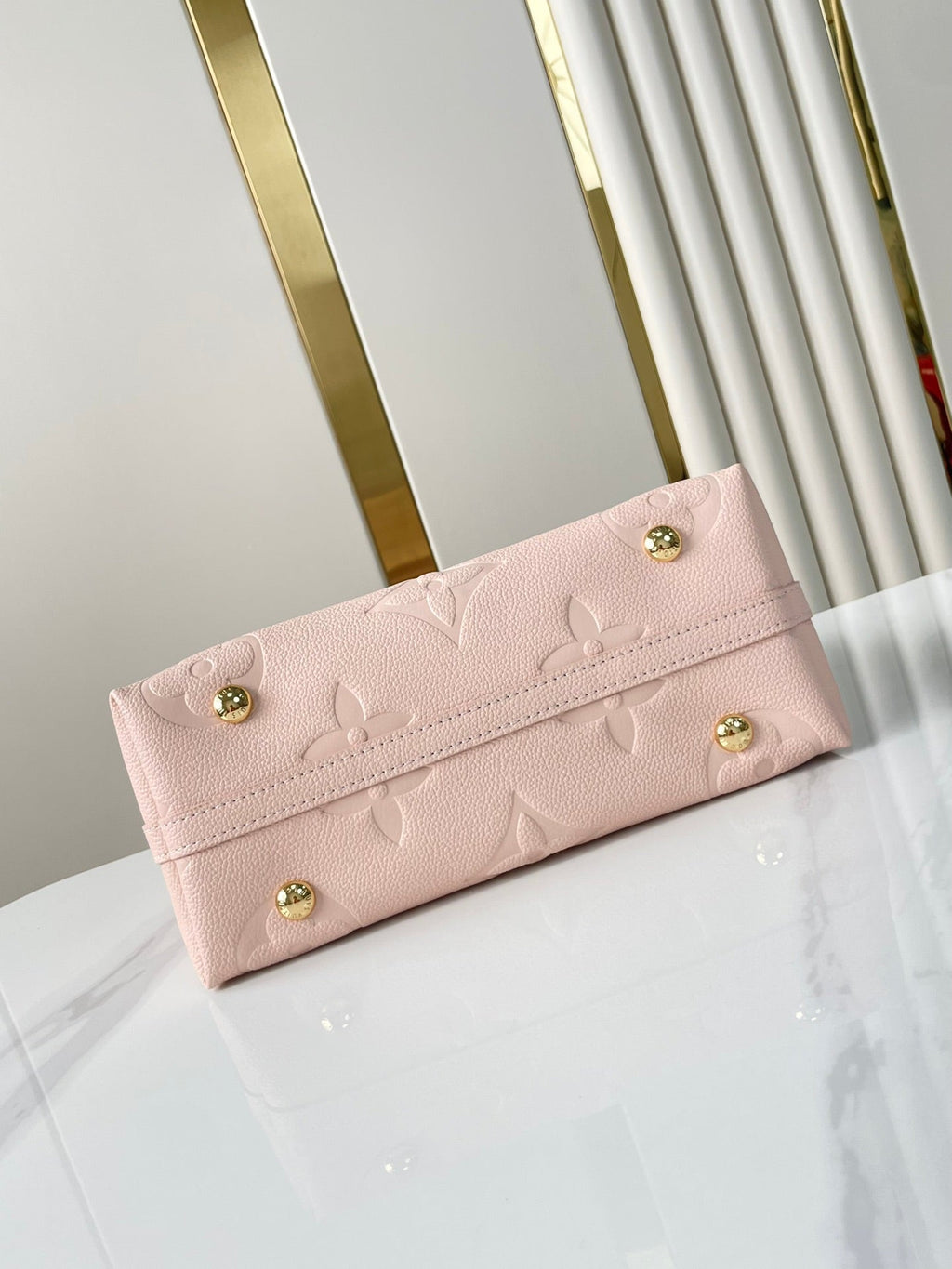 CARRYALL 29 IN LIGHT PINK MONOGRAM EMPREINTE LEATHER