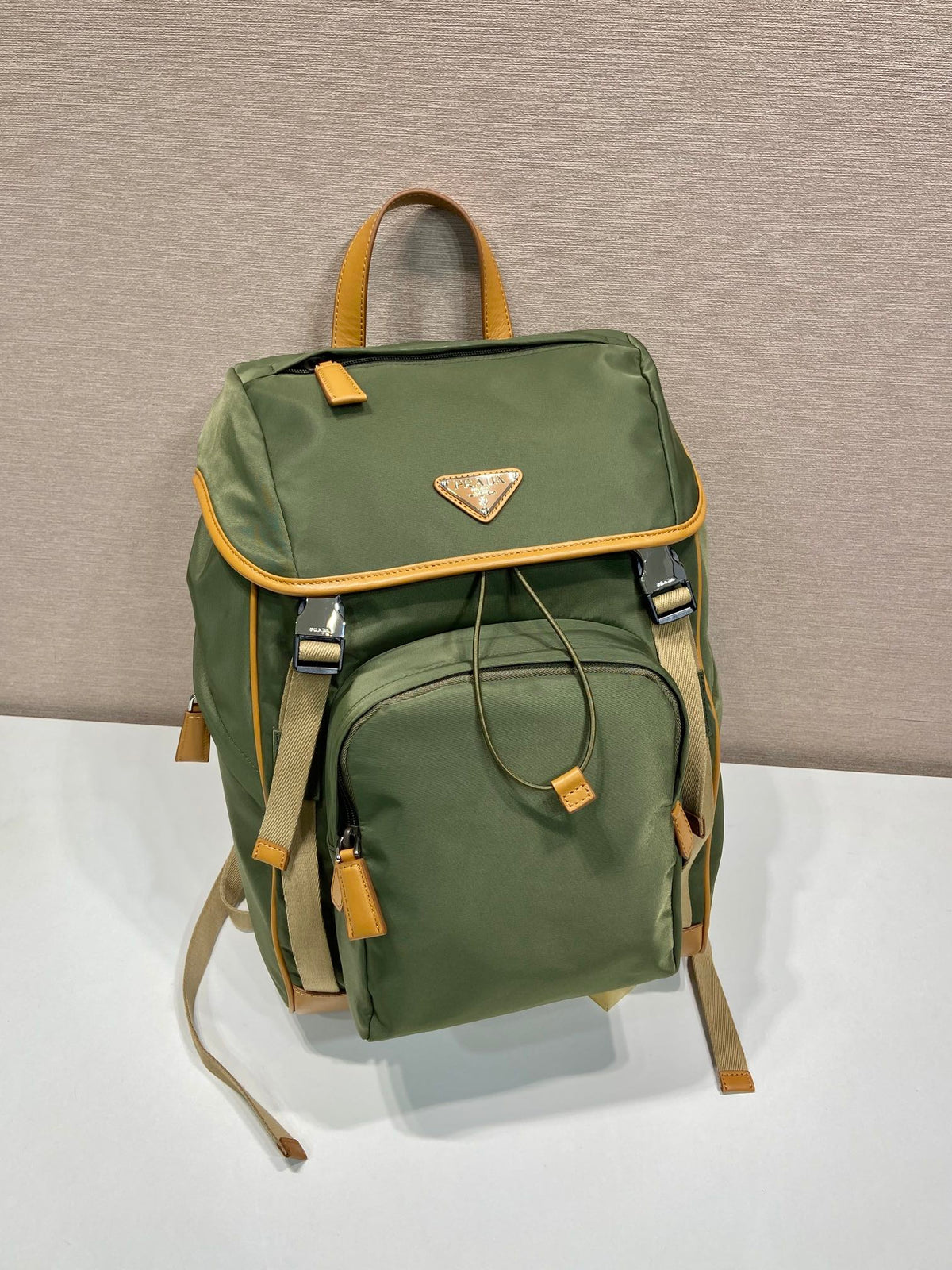 BACKPACK 45 IN SEAWEED GREEN RE-NYLON AND BROWN CALFSKIN TRIM