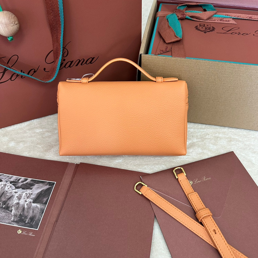 EXTRA POCKET L19 IN MANGO ORANGE GRAINED CALFSKIN WITH GOLD HARDWARE