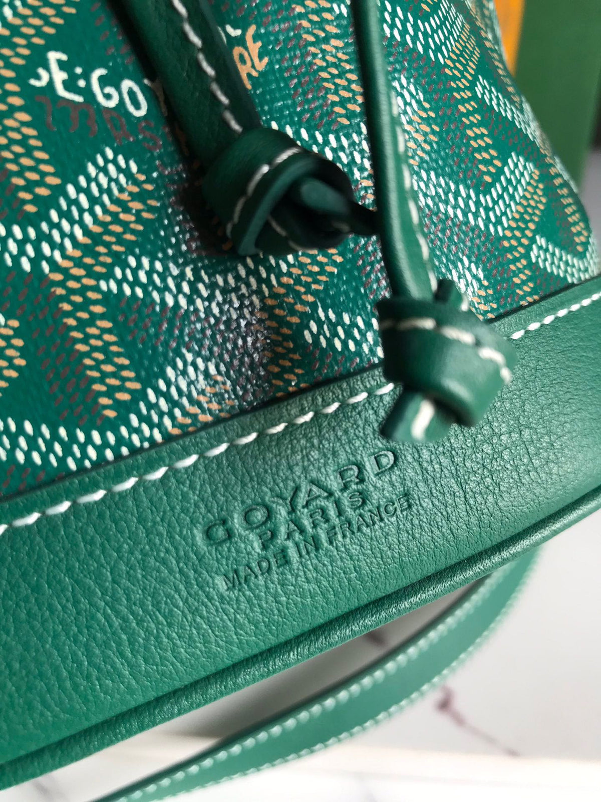PETIT FLOT BUCKET BAG 22 IN GREEN GOYARDINE CANVAS AND LAMBSKIN TRIM