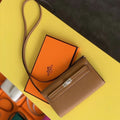 HERM Kelly Classique To Go Wallet In Gold Epsom Calfskin
