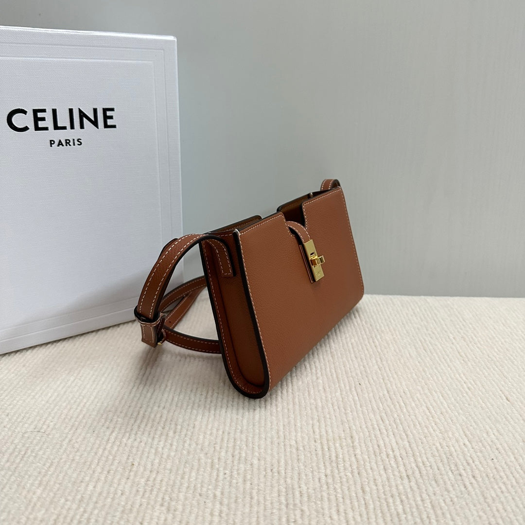 16 STRAP POCHETTE 18 IN BRONZE ORANGE SUPPLE CALFSKIN GOLD HARDWARE