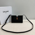 16 STRAP POCHETTE 18 IN BLACK SUPPLE CALFSKIN GOLD HARDWARE