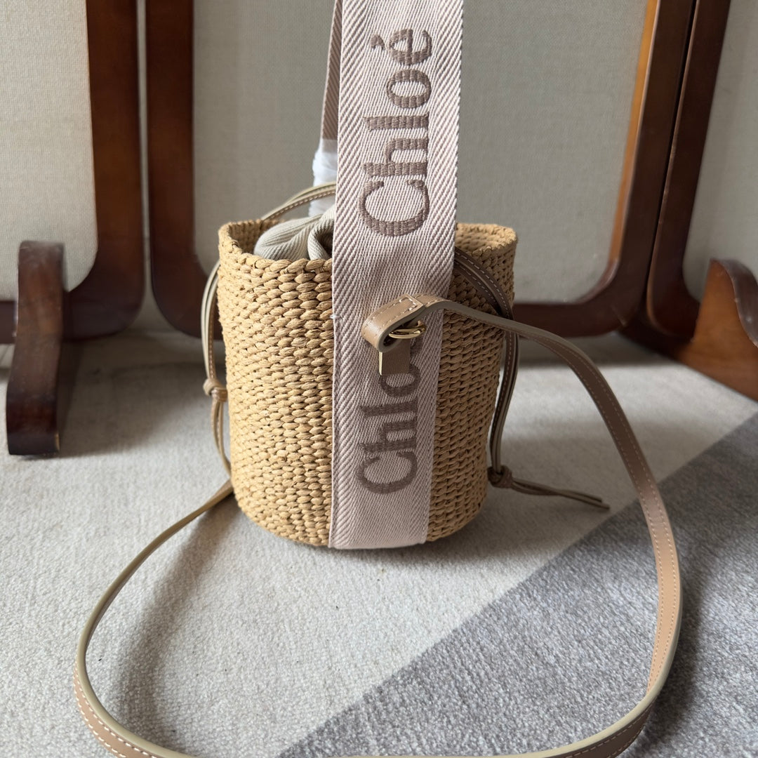 SMALL WOODY BASKET 17 IN NATURAL FIBERS BLUSHY BEIGE WEBBING BROWN CALFSKIN