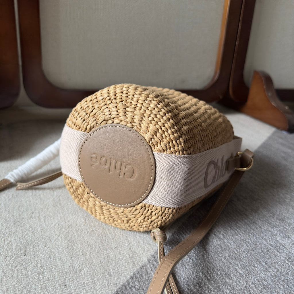 SMALL WOODY BASKET 17 IN NATURAL FIBERS BLUSHY BEIGE WEBBING BROWN CALFSKIN