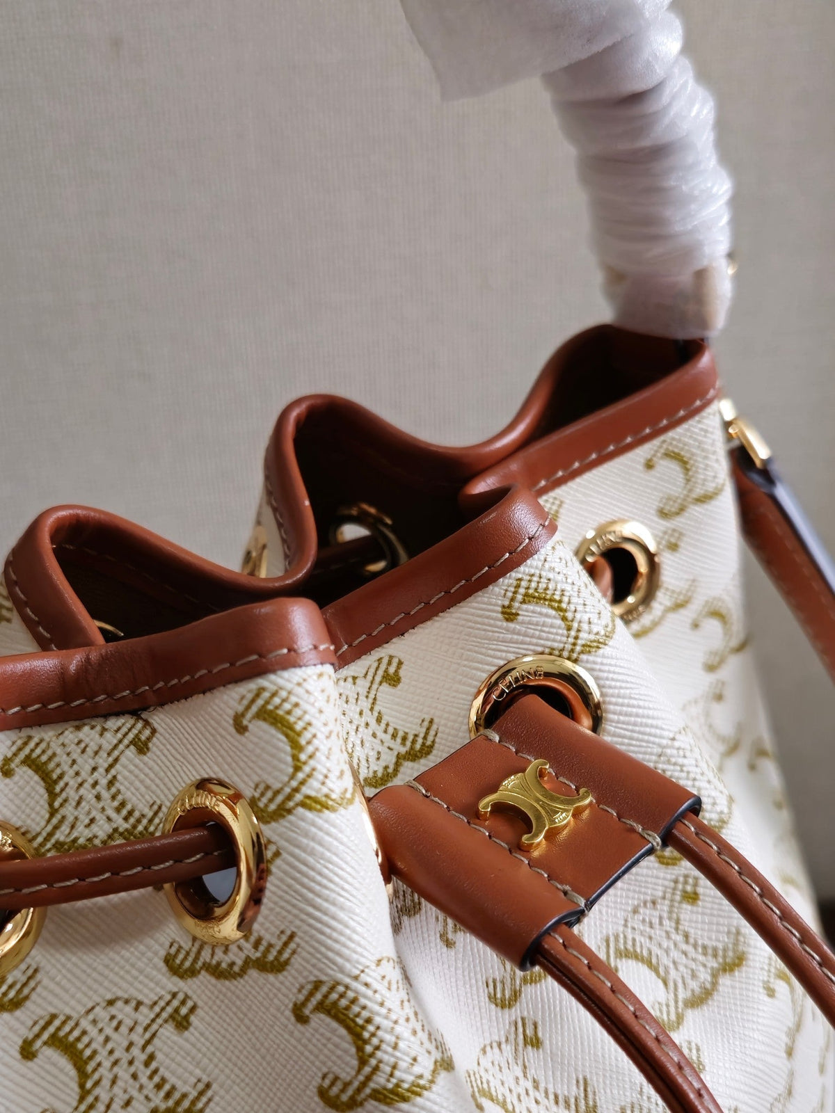 CLARA BAG 19 IN WHITE TRIOMPHE CANVAS AND BROWN CALFSKIN TRIM