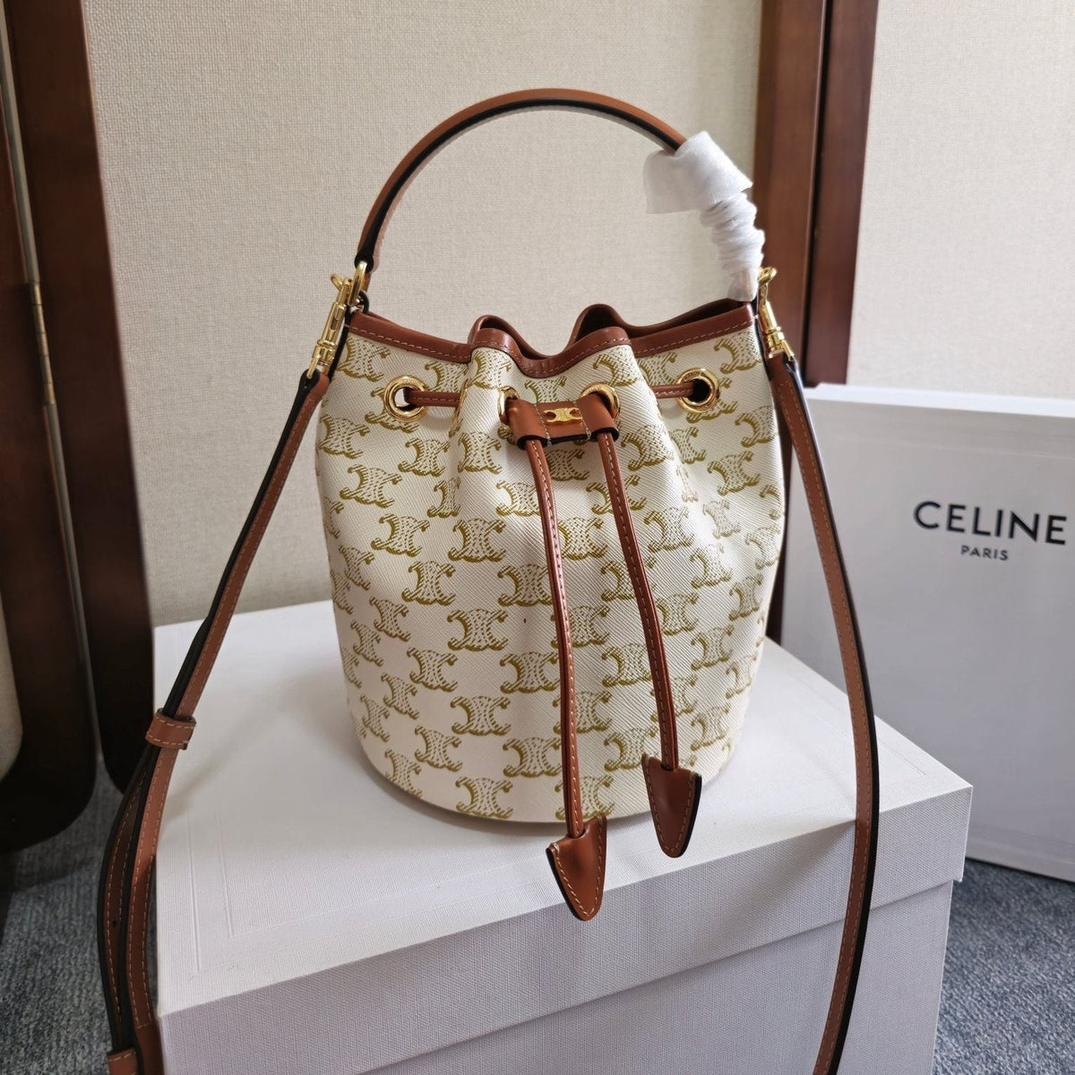 CLARA BAG 19 IN WHITE TRIOMPHE CANVAS AND BROWN CALFSKIN TRIM