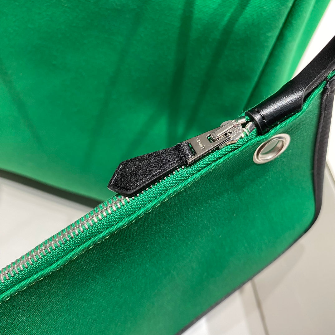 HERBAG A DOS ZIP RETOURNE BACKPACK 29 IN GREEN CANVAS AND BLACK CALFSKIN