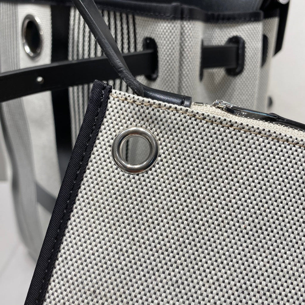 HERBAG A DOS ZIP RETOURNE BACKPACK 29 IN OFF-WHITE MIX BLACK CANVAS AND CALFSKIN
