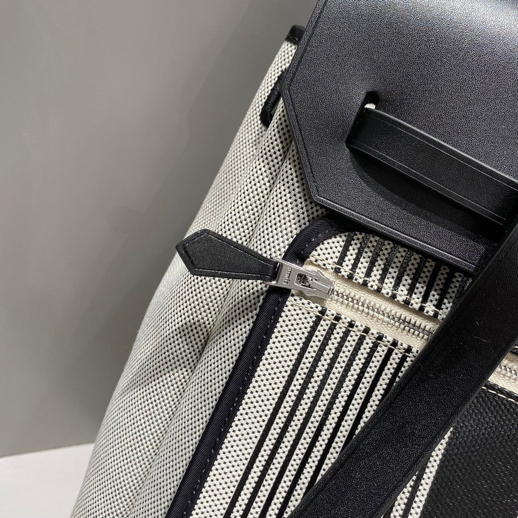 HERBAG A DOS ZIP RETOURNE BACKPACK 29 IN OFF-WHITE MIX BLACK CANVAS AND CALFSKIN