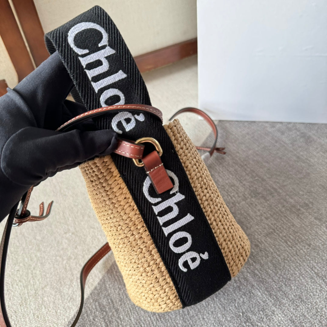 SMALL WOODY BASKET 17 IN NATURAL FIBERS BLACK WEBBING BROWN CALFSKIN