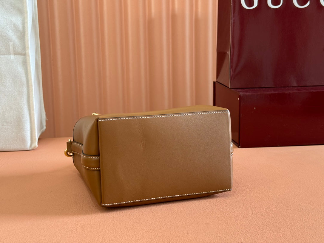 EMBLEM SMALL BUCKET BAG 19 IN BROWN SMOOTH CALFSKIN