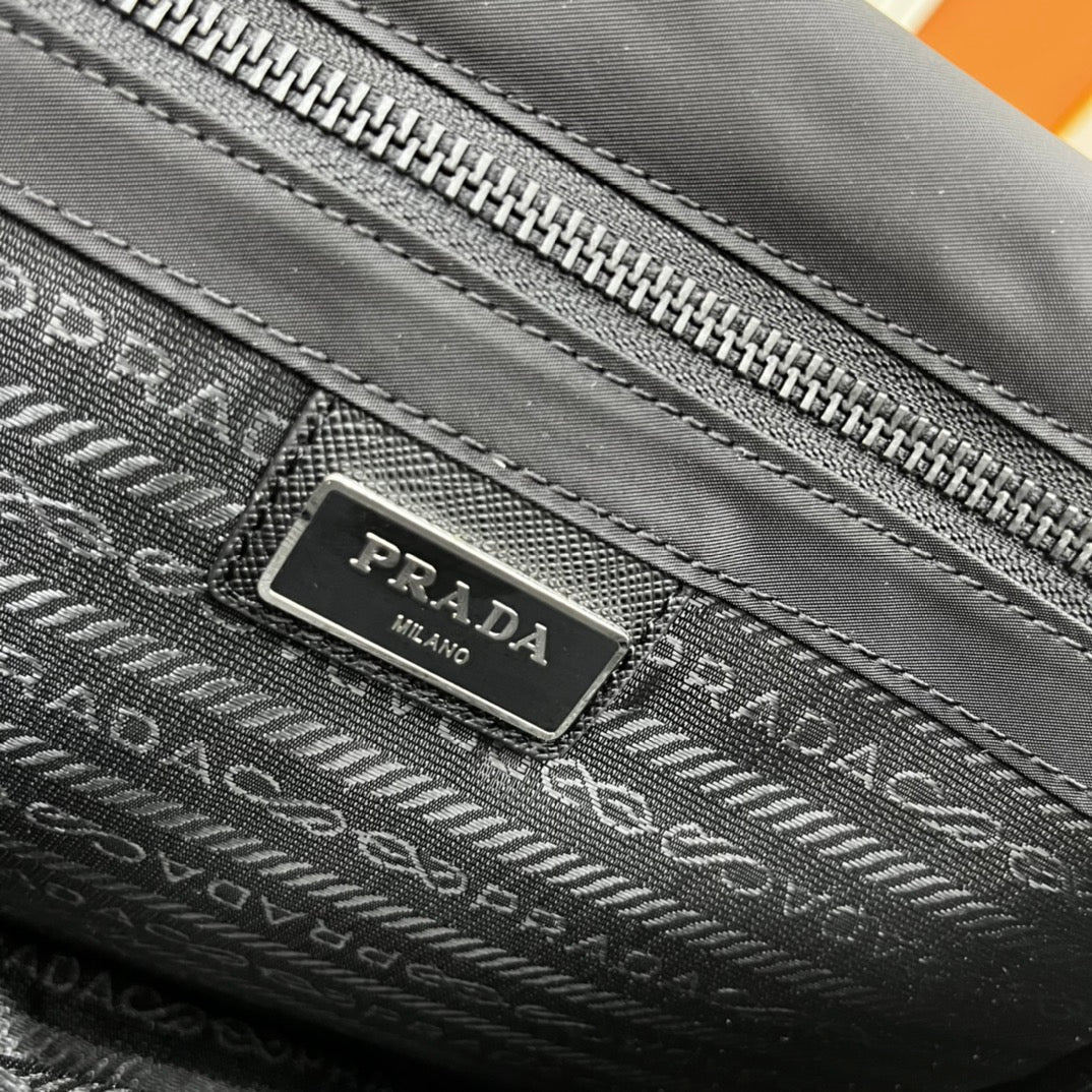 PRA 26 SHOULDER BAG IN BLACK RE-NYLON AND SAFFIANO LEATHER