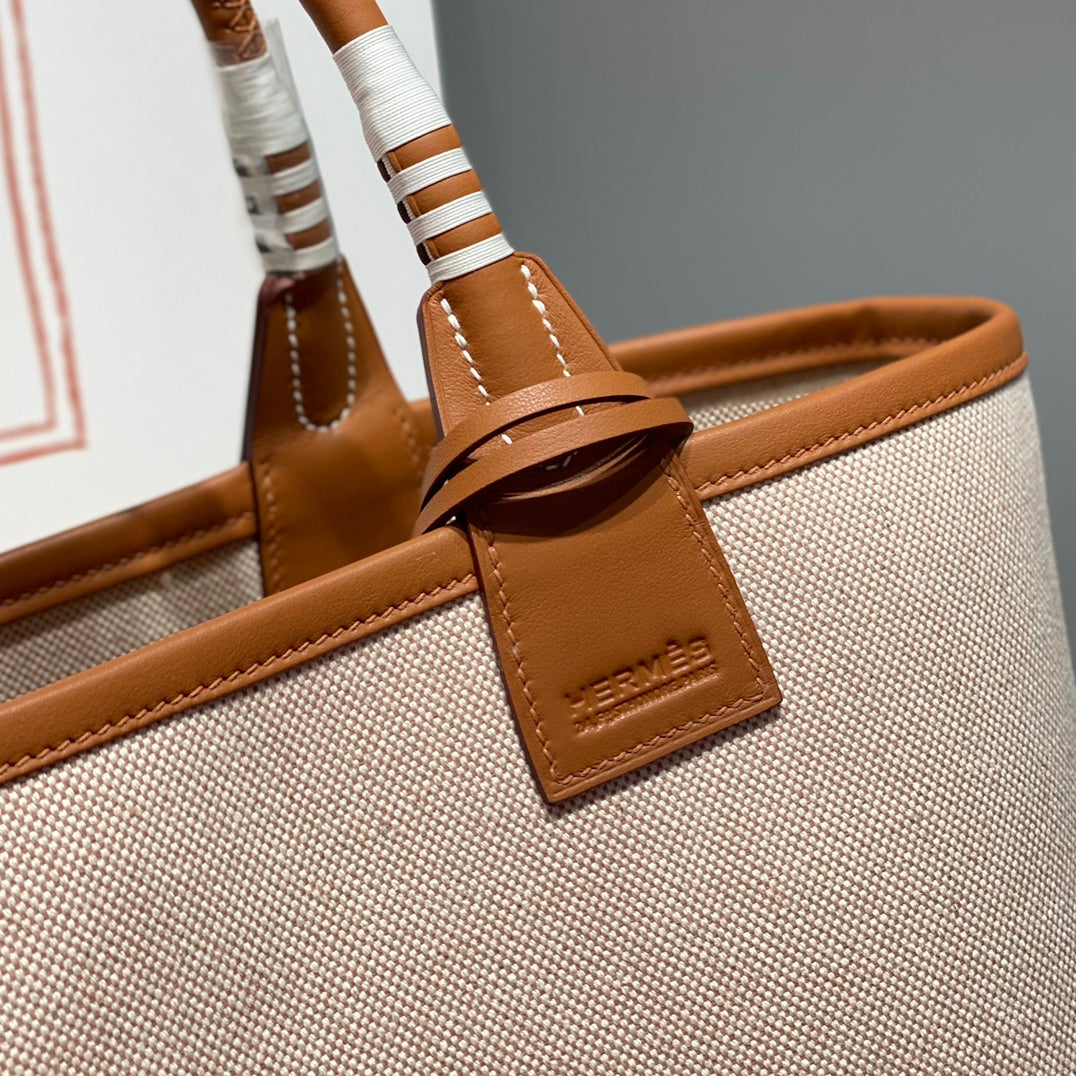 STEEPLE 28 BAG IN OFF-WHITE H CANVAS AND BROWN SWIFT CALFSKIN
