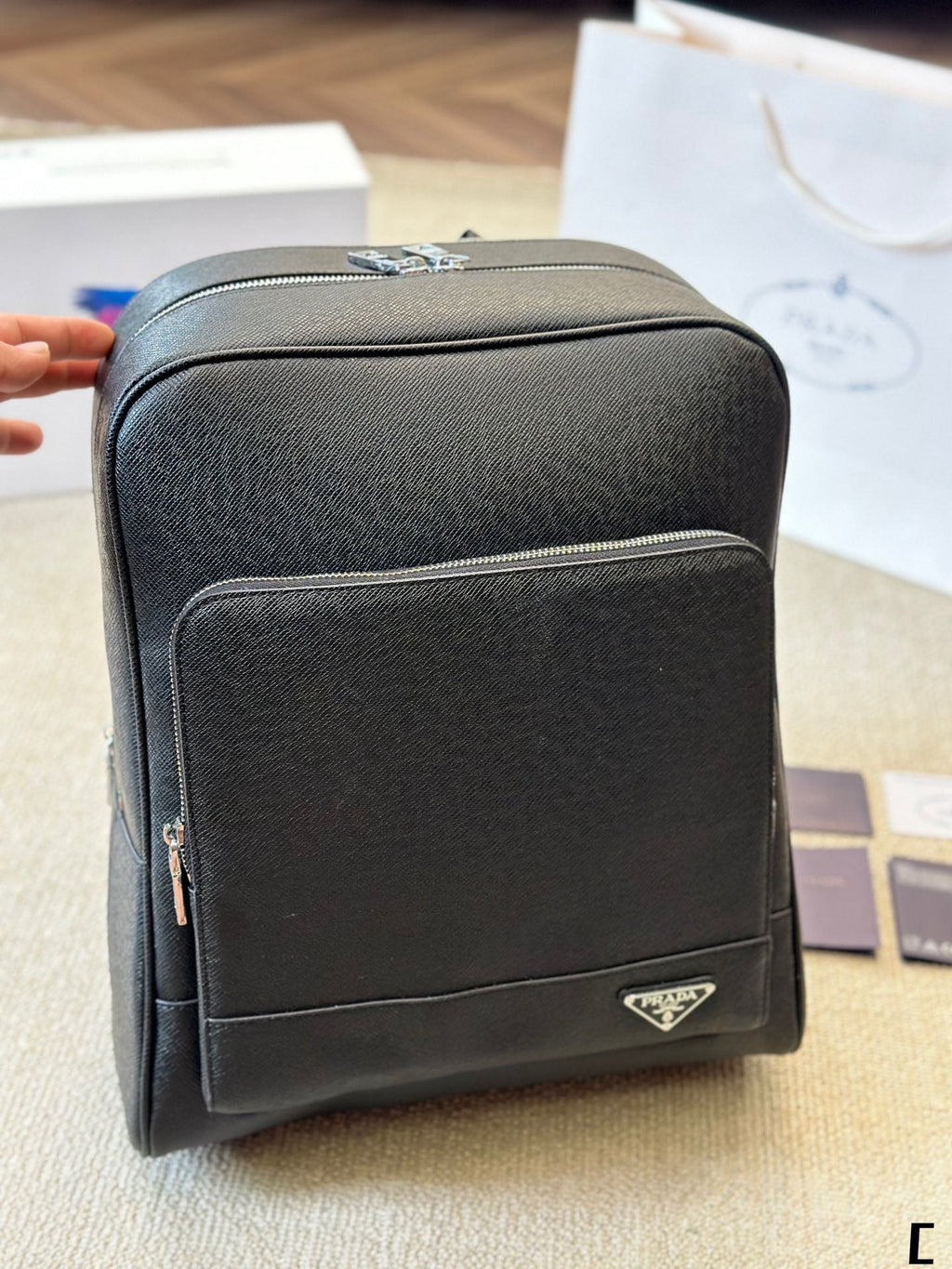 FRONT ZIP POCKET BACKPACK 38 IN BLACK GRAINED CALFSKIN