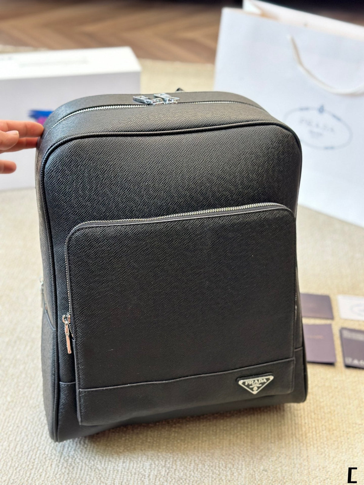 FRONT ZIP POCKET BACKPACK 38 IN BLACK GRAINED CALFSKIN