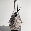 SMALL SOLSTICE 30 IN SNAKE PATTERN CALFSKIN